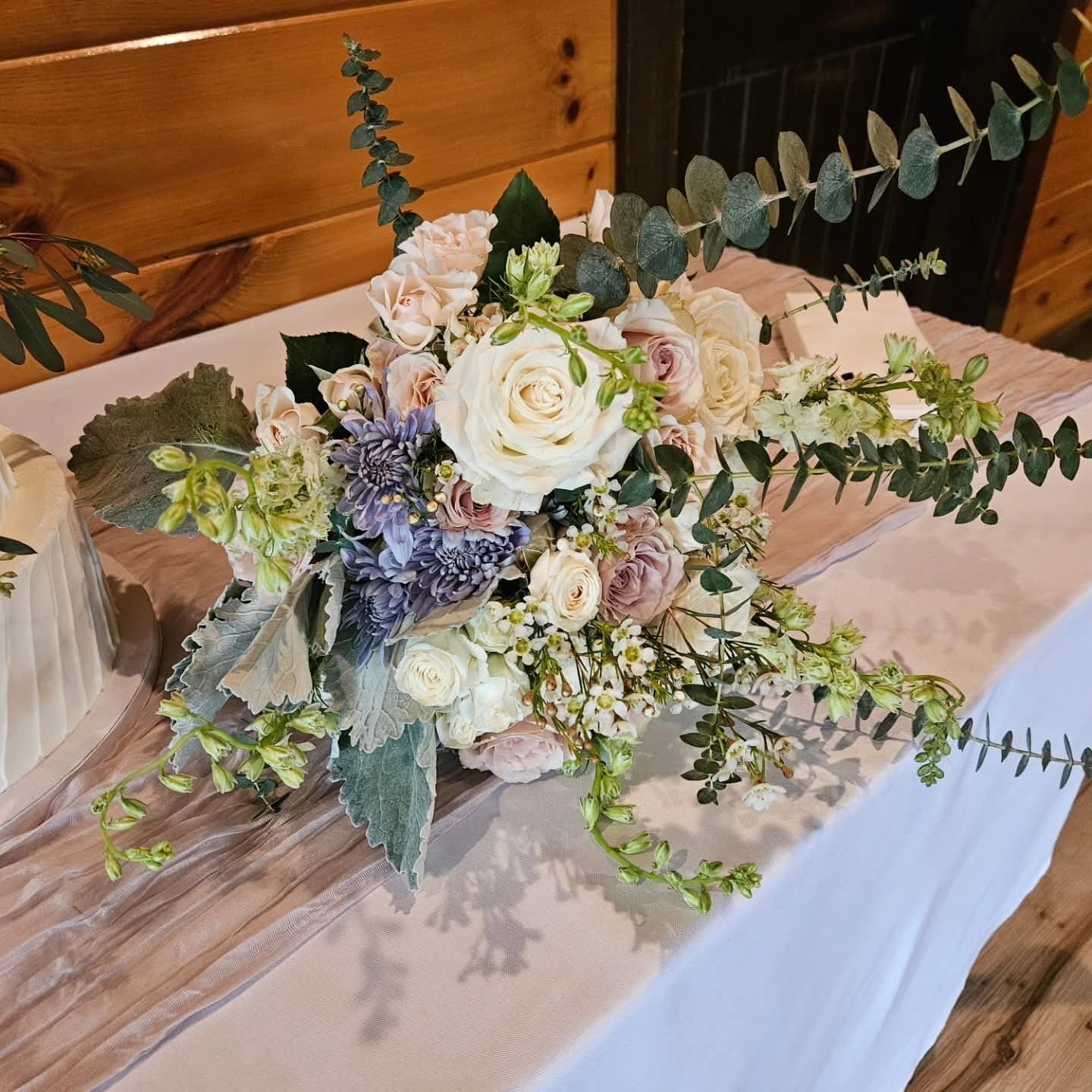 Elegant rustic wedding bouquet on table - real client work